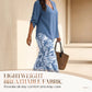 Conjunto composto por uma blusa feminina com decote em V e umas calças largas com padrões