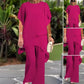 Conjunto encantador de blusa irregular e calça pantalona