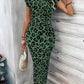 Acquis🥳2026 PROMOÇÃO ESPECIAL 50% DE DESCONTO! 🥳💞Mais de 50 mil unidades vendidas!🌸Vestido justo com nó para mulher – Estampado de leopardo, com nó que realça a barriga. Confortável e elegante para festas ou encontros à noite. Sinta-se deslumbrante.