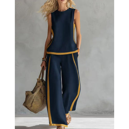 Conjunto casual composto por um top sem mangas com blocos de cor e calças de perna larga