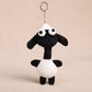 Pingente em forma de saco com animal de pelúcia de pescoço comprido